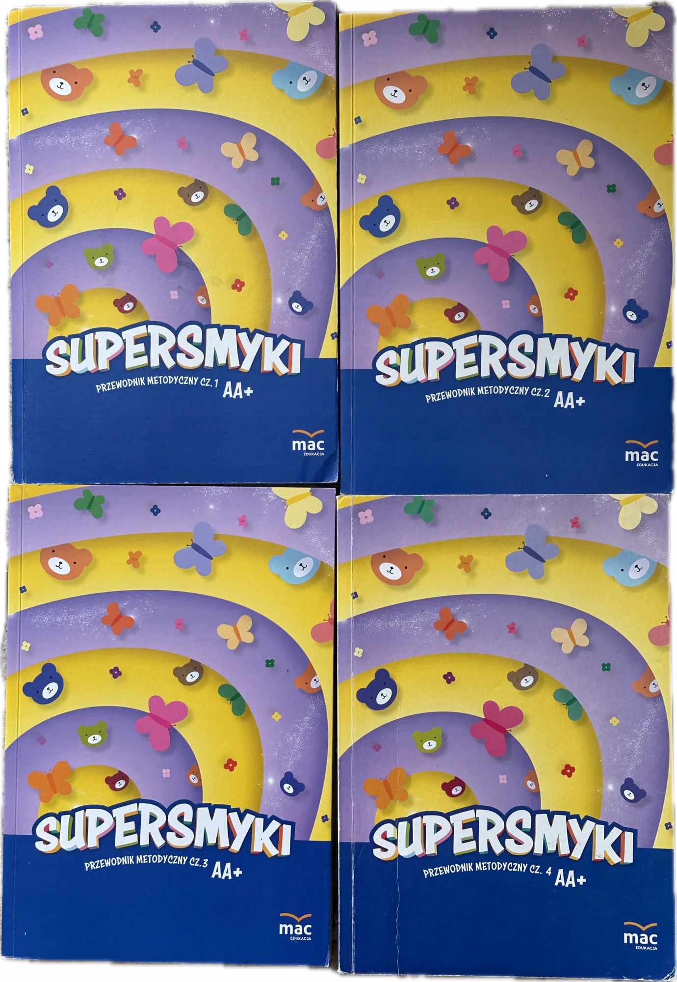 Okładka: SUPERSMYKI Przewodniki Metodyczne dla nauczyciela AA+ cz 1-4