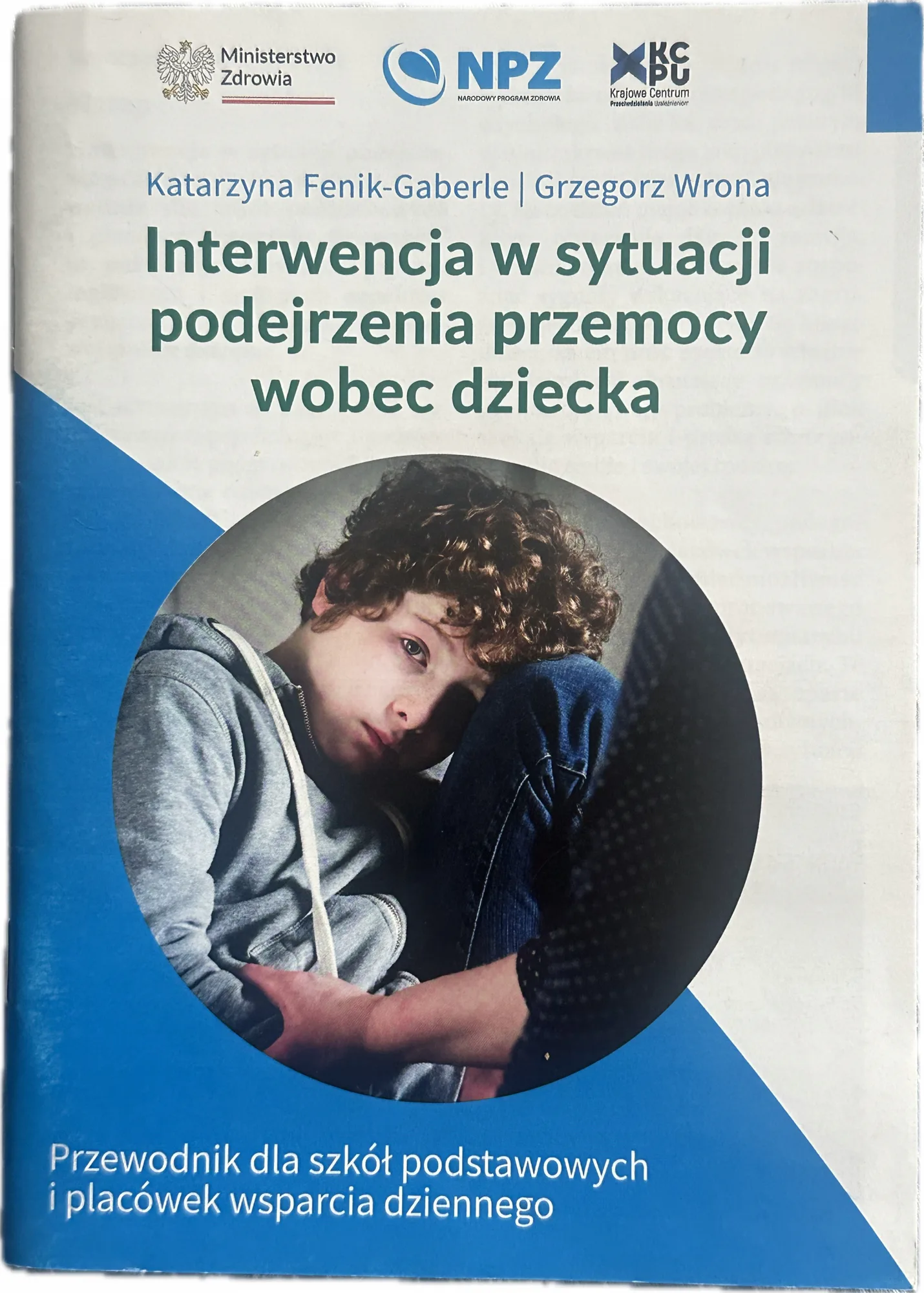 Okładka: Interwencja w sytuacji podejrzenia przemocy wobec dziecka