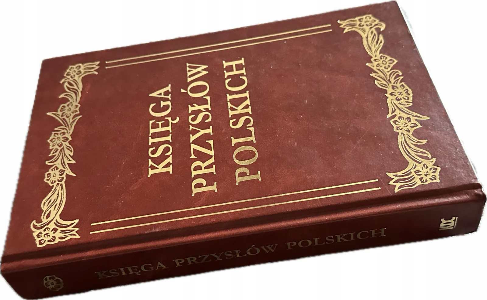 Okładka: Jolanta Muras - Księga przysłów polskich skóra